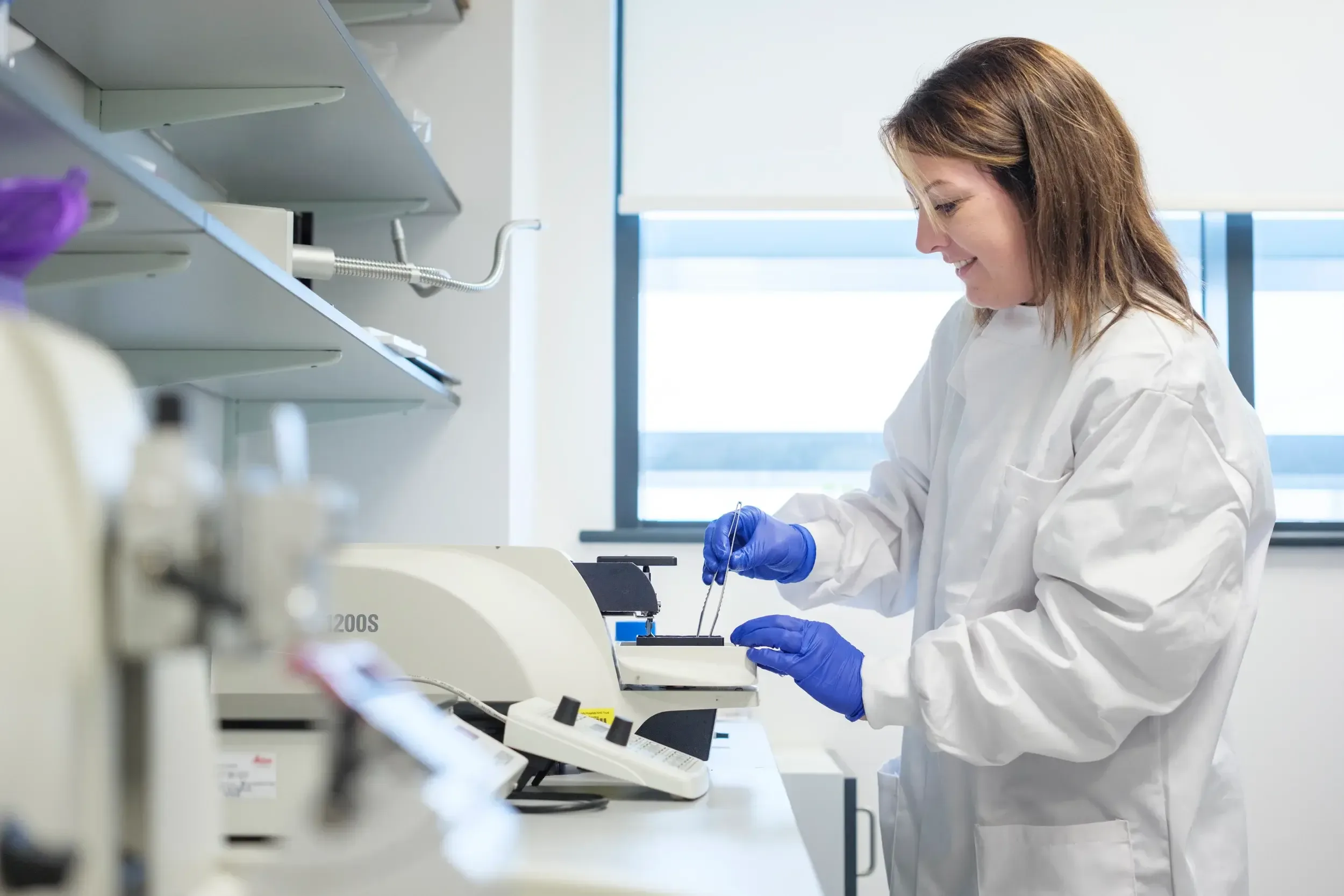 A research scientist, Amanda Tatler, conducts her work in the lab